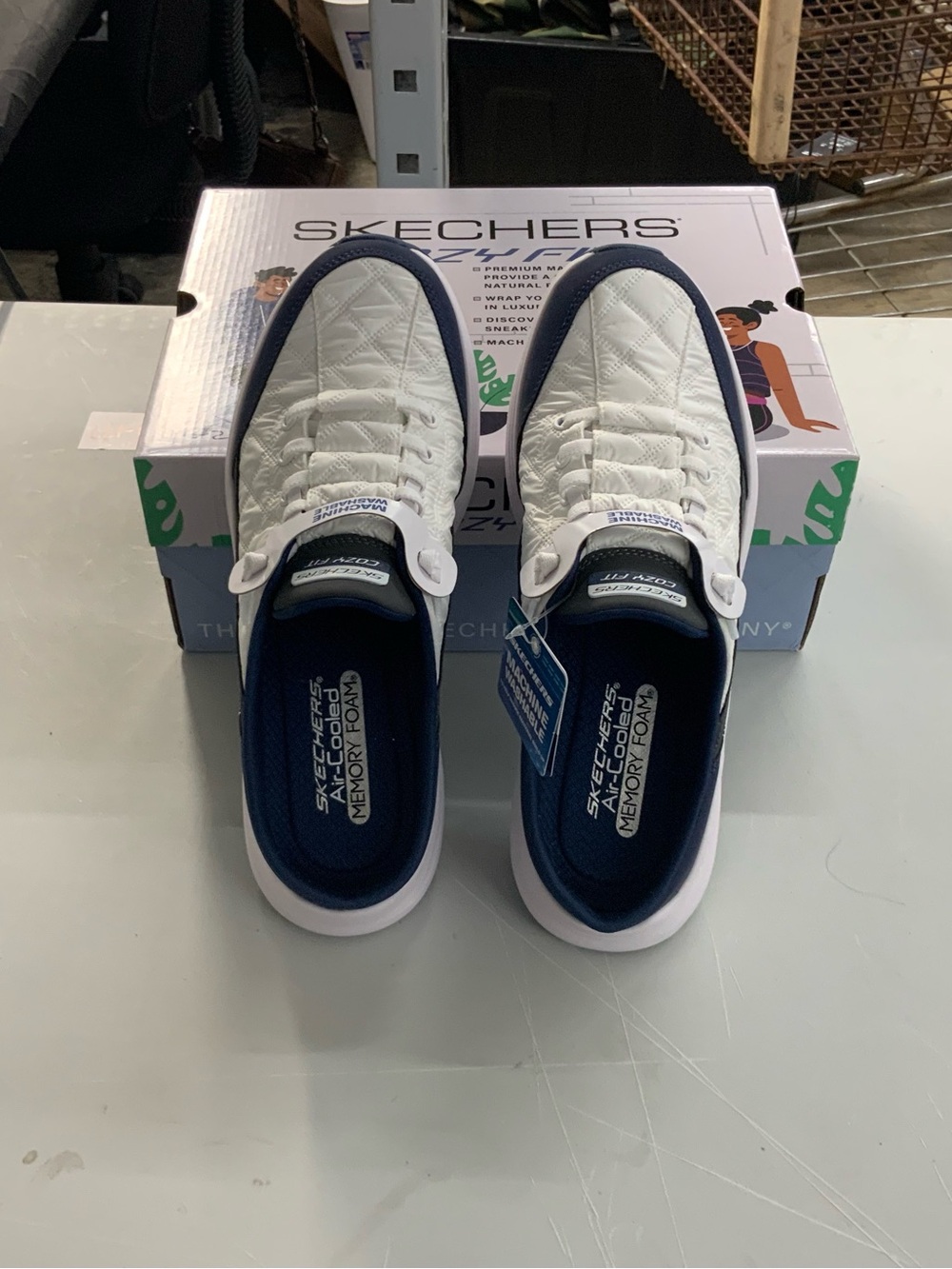 Skechers Men’s White and Navy Quilted Slip-On Sneakers